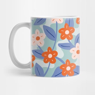 Wavy flower pattern in blue and orange Mug